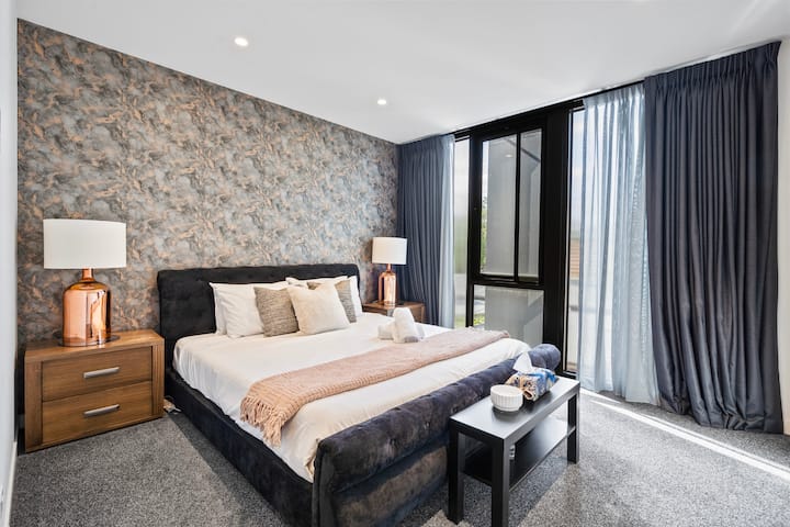 Spacious master bedroom with ensuite on the first level.