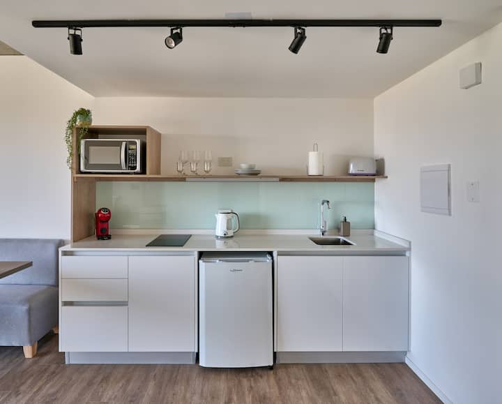 Kitnet novo com varanda e vista para o rio e a cidade em Puerto Madero