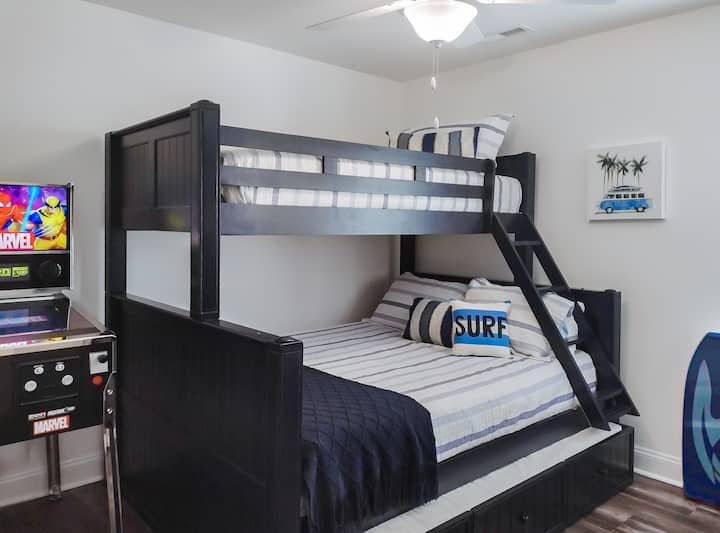 The top bunk here is an XL Twin bed, the lower bunk is a Queen ~ with Trundle