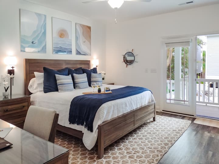 Just off the kitchen, our downstairs King features chic decor and a premium mattress!