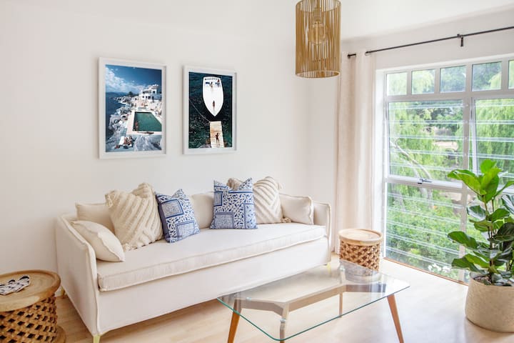 Chic 2BR Retreat | Pool + Balcony Near the Beach