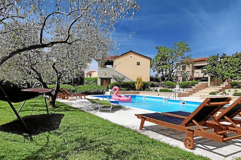 Top Airbnb: Holiday flat with large pool in medieval Bale in Gajana