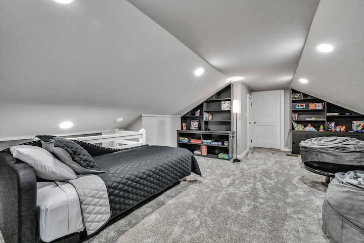 The upstairs loft provides sleeping for two on a daybed and fold-out mattress. There's so much to do on rainy days with a little free adult's library, kids books and toys, puzzles and table, art supplies, and coloring books. 