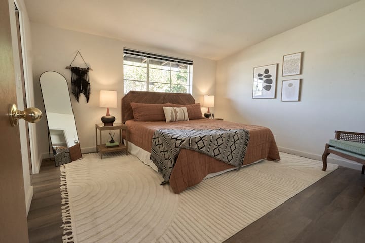 Master King bed | Ratan headboard | Bamboo Sheets | Full length mirror | Up and down black out shades | Attached bathroom