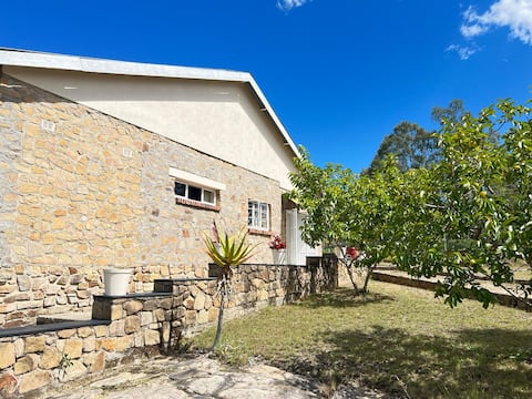 KHH Stone Cottage at John Galt Village Main Gate