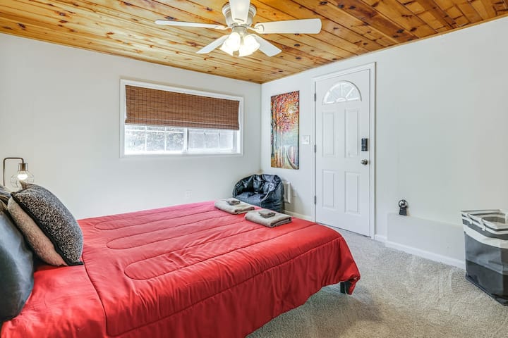 Relax in queen bedroom with blackout shades for deep rest
