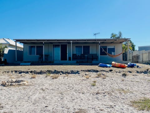 Waterfront shack at Dutton Bay