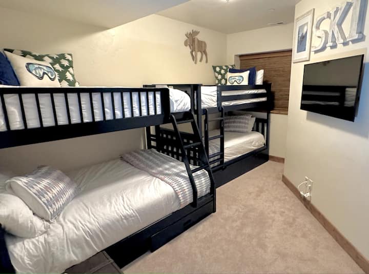 Super fun Bunk Room features twin over full & twin over twin bunk beds