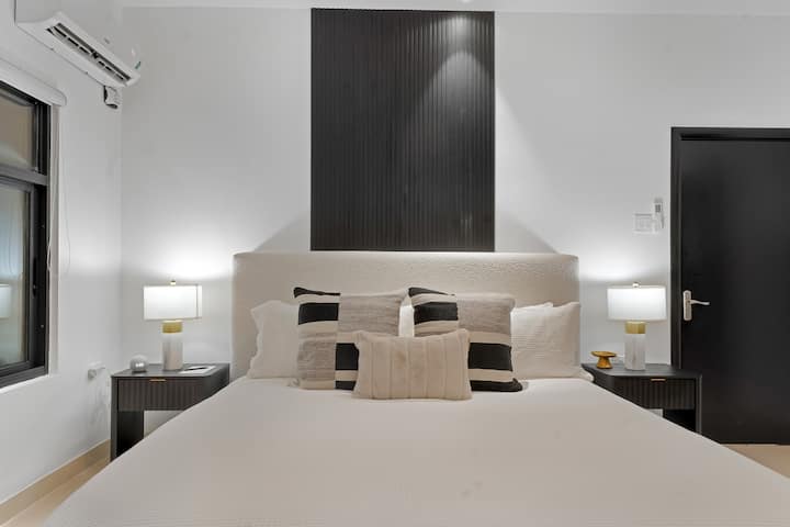 Primary Suite | King bed | 50 inch Samsung TV | Echo Dot w/ clock | Full length mirror | Fan | Ring light | Beach towels | Beach bag | Umbrellas | Luggage racks | Hair blow dryer