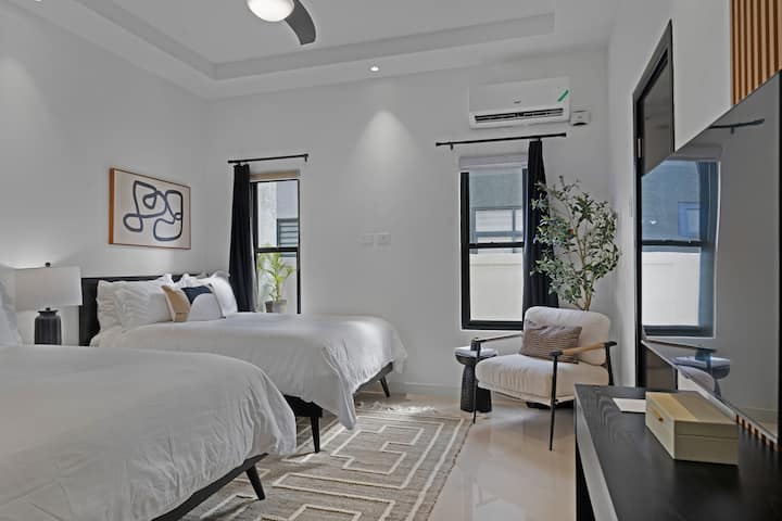 Suite 3 | 2 Full beds | 40 inch Samsung TV | Echo Dot w/ clock | Fan | Beach towels | Beach bag | Umbrellas | Luggage rack | Step stool