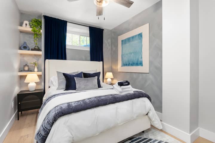 This bedroom offers a relaxing escape with comfortable amenities.
