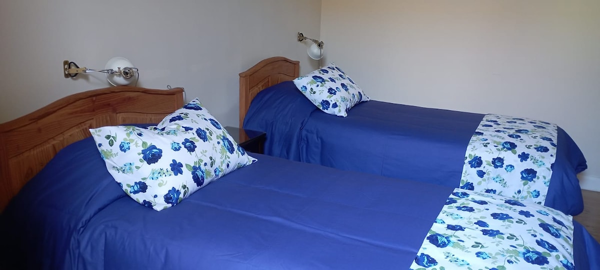 Double bedroom (2 twin beds) and private bathroom. + shared living kitchen.