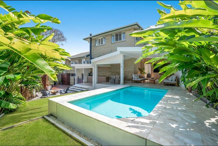 City-View Sanctuary with Tropical Poolside Retreat gallery image 2