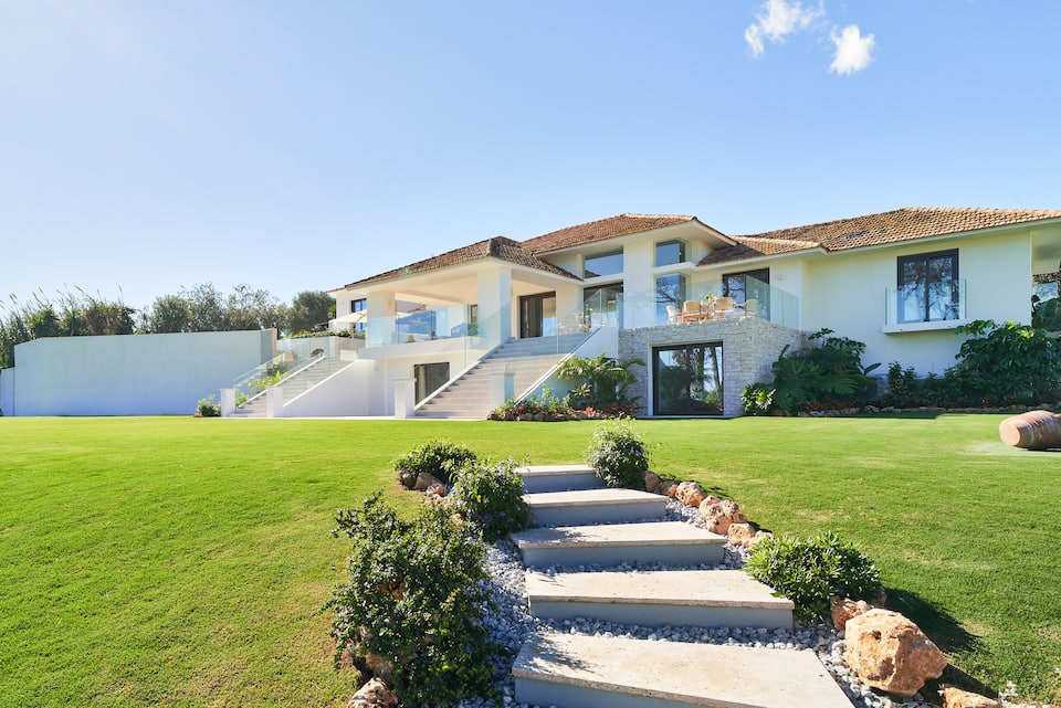 A white modern villa in big Marbella gardens, Marbella, Andalusia, Spain, photo 1 of 10