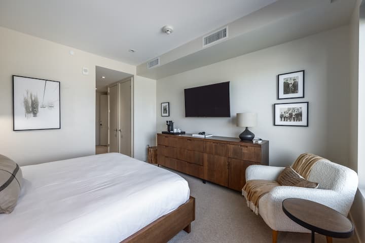 King bed and cozy reading chair