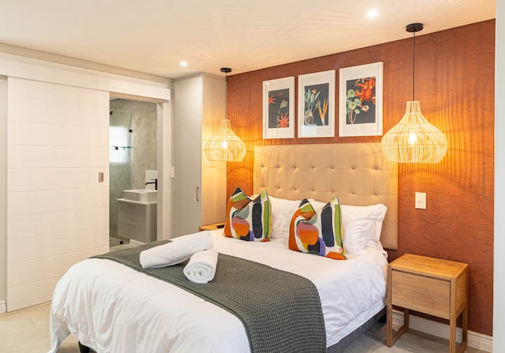 Second bedroom with en-suite bathroom with shower, toilet and basin 