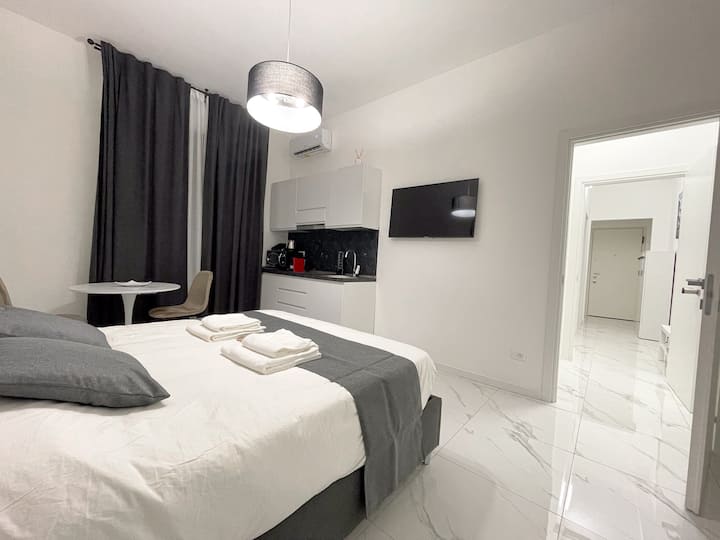 Near the subway and San Raffaele Hospital with kitchen