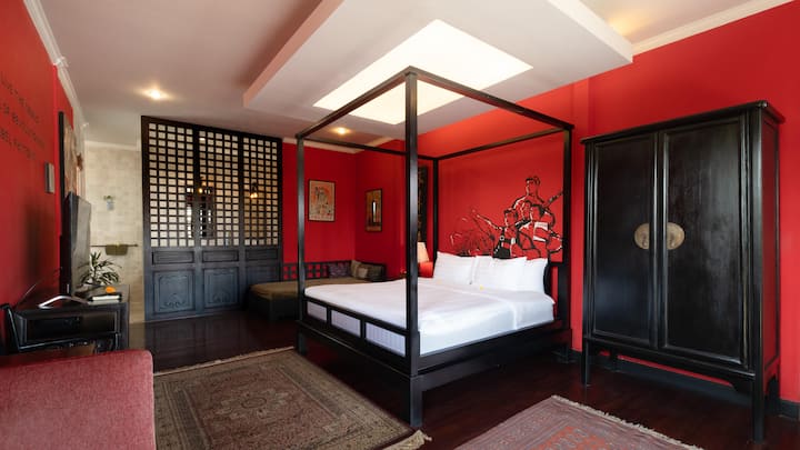 A charming Chinese-themed room on the first floor, featuring elegant décor inspired by traditional motifs, a plush king bed, and a private ensuite bathroom for your comfort.