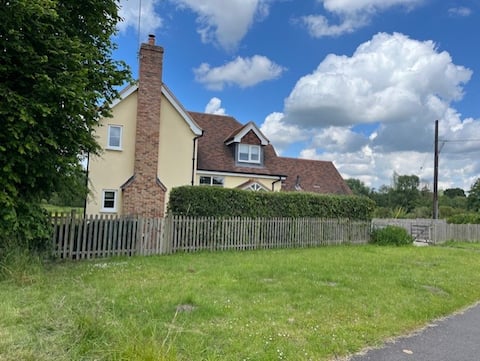 Detached surrounded by fields