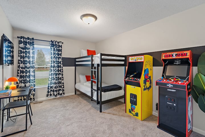 The ultimate hangout spot-com complete with bunk beds, retro arcade games, and a cozy study corner. Game on!