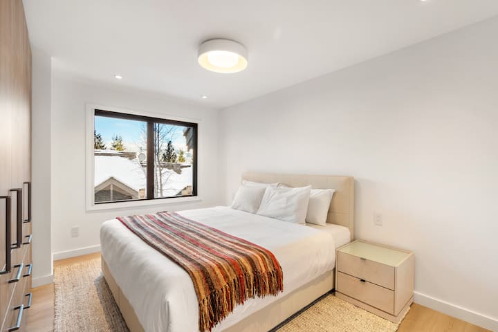Featuring a plush king bed, ample storage, and an ensuite bathroom, enjoy breathtaking views.