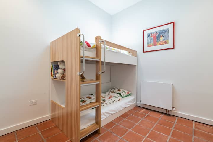 3e chambre avec lits superposés