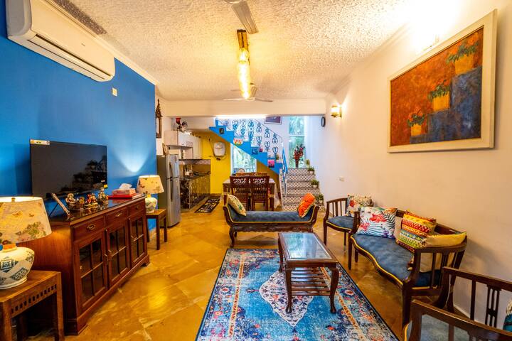 A cozy and well-lit living room with comfortable seating, perfect for relaxing or spending time with loved ones.
