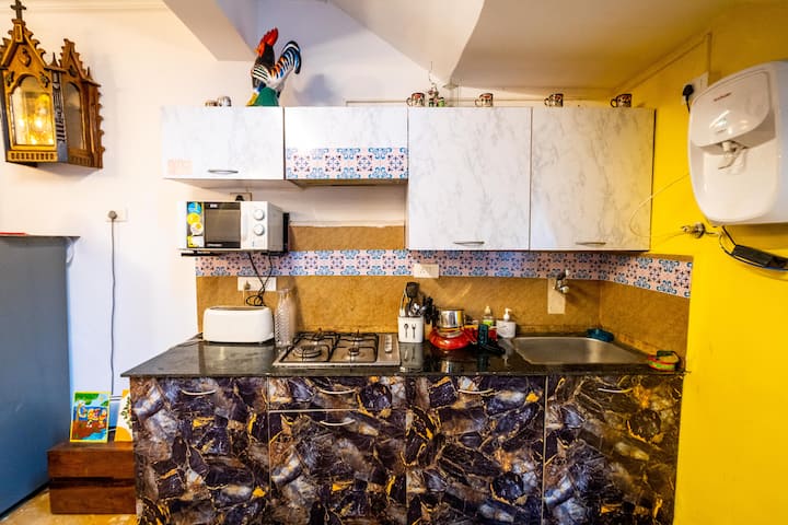 Clean and functional kitchen space, perfect for guests who prefer to cook their own meals during the stay.
