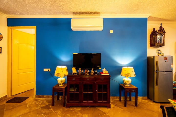 A cozy and well-lit living room with comfortable seating, perfect for relaxing or spending time with loved ones.