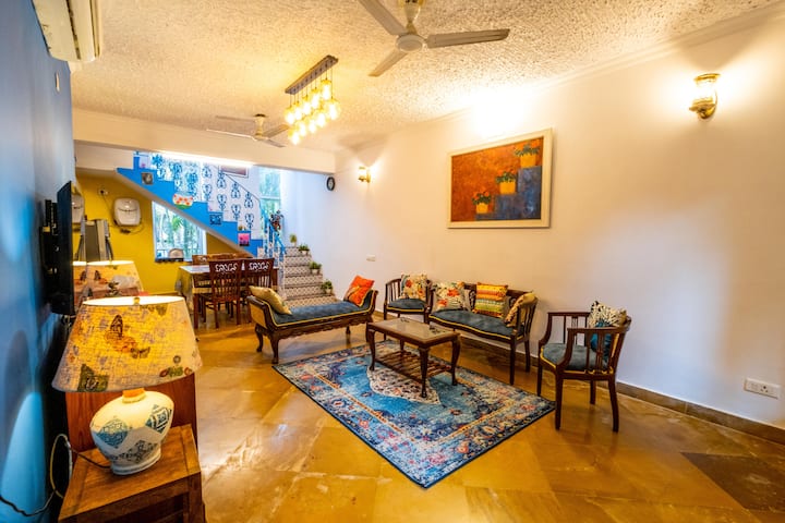 A cozy and well-lit living room with comfortable seating, perfect for relaxing or spending time with loved ones.