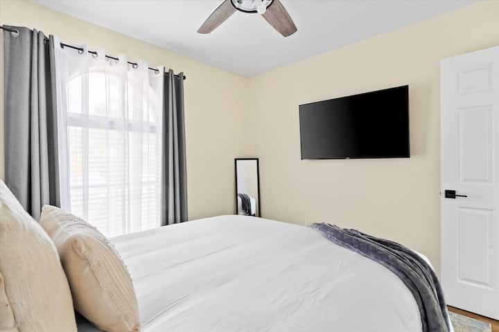 Enjoy restful nights in a bright, airy bedroom with clean lines and contemporary design.