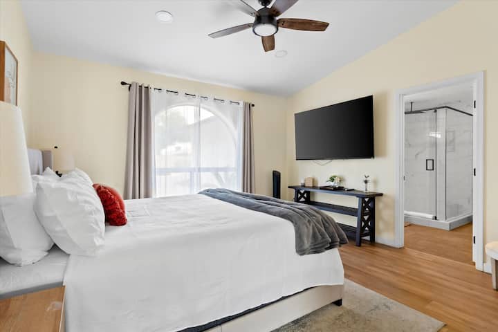 Wake up refreshed in a spacious retreat with cozy textures and modern comfort.