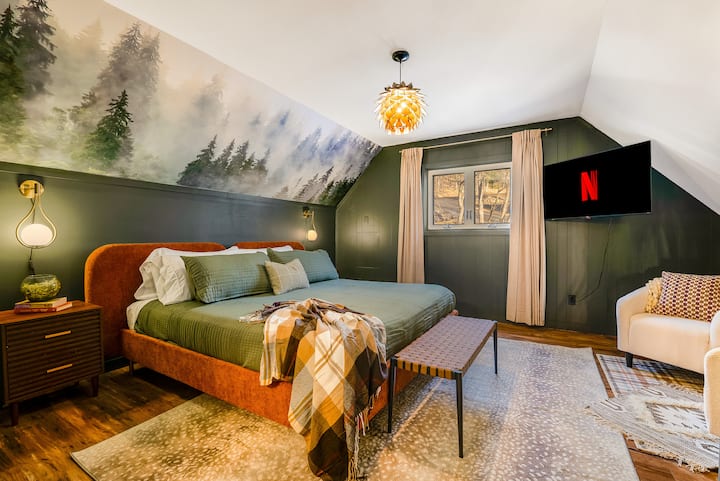 Master bedroom has a king bed, in suite bathroom, HDTV and seating area