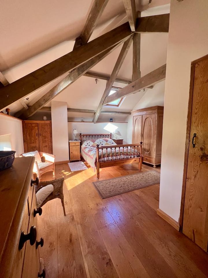Master bedroom with lovely view over Devon countryside.
