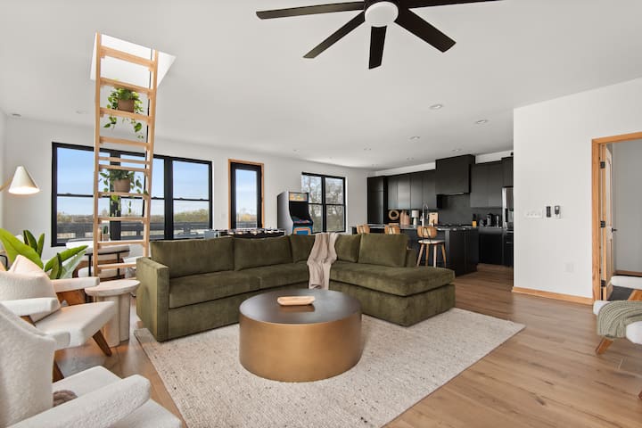 The Top Floor living area with panoramic views of Nashville! - please note, the ladder doesn’t lead anywhere