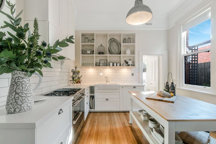 Charming terrace in CBD with private parking.