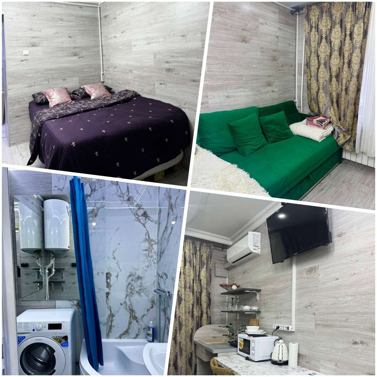 A spacious sleeping area features a dark bedspread on a large bed with two decorative pillows. A cozy green sofa adds color in another corner, while a modern bathroom showcases a laundry machine nearby. A small kitchenette is equipped with essential appliances and a flat-screen TV is mounted on the wall.