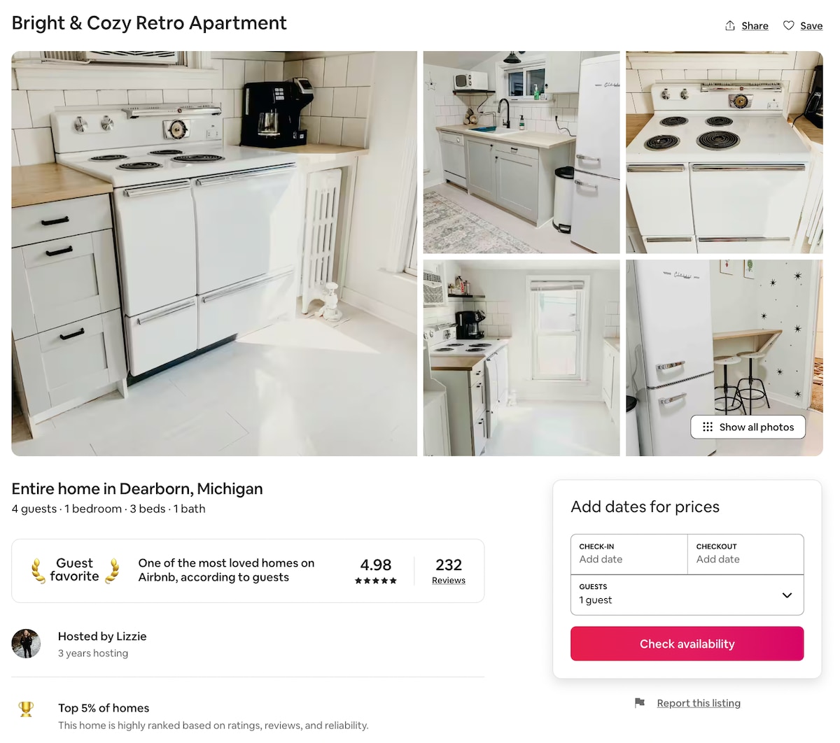 A modern kitchen is equipped with essential appliances, including a refrigerator, stove, and sink. The clean, white cabinetry contrasts with the sleek countertops. Natural light floods the space, highlighting the tiles and creating an inviting cooking area.