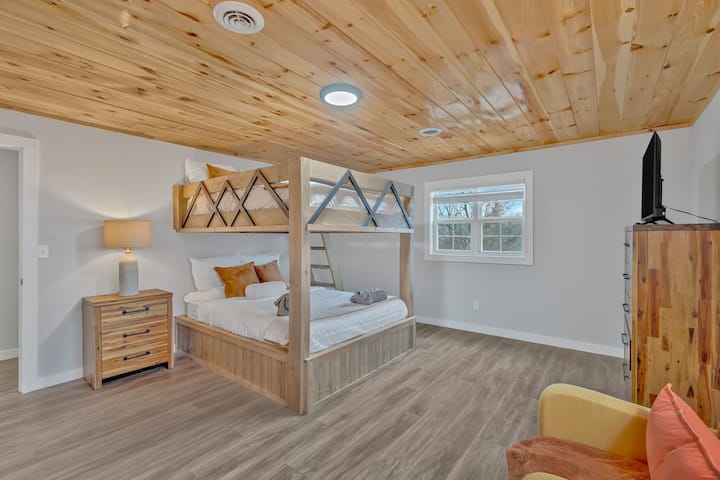 Bunk Room: Fun lofted beds and warm wood accents for a playful, family-friendly retreat!