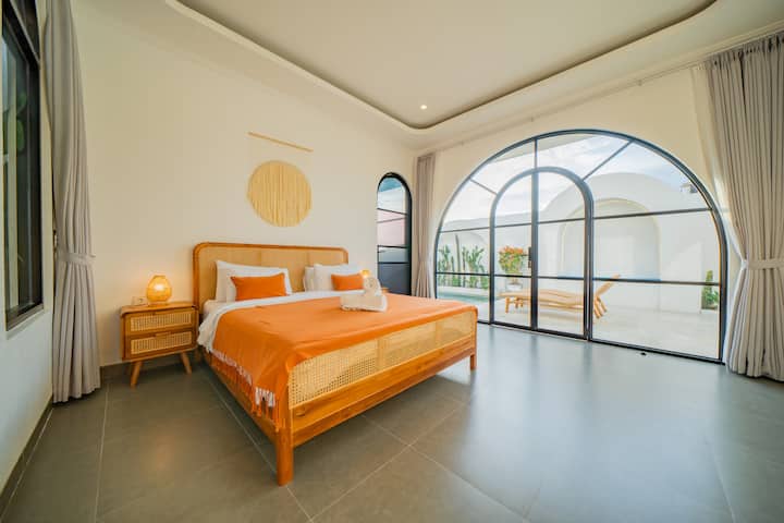 Sleep with a View – Wake up to stunning pool views and enjoy a peaceful night’s rest in this cozy bedroom.