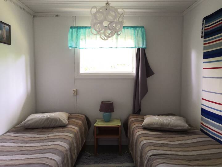 The bedroom behind the kitchen.