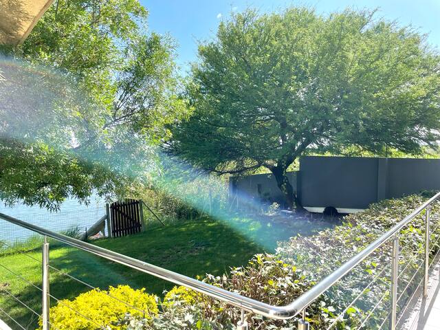 Home in a beautiful setting on the water’s edge gallery image 4