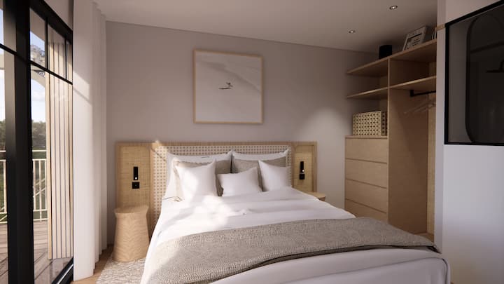 Chambre avec vue mer et accès direct à la grande terrasse avec le bain norvégien. Symétrique et identique à la chambre 2