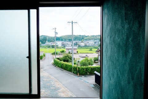 A rice farm stay with a private garage. Ample parking space
