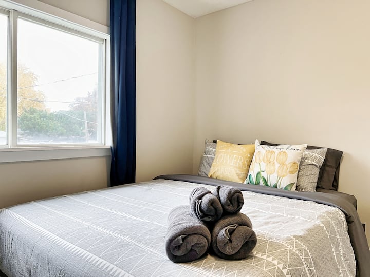 Another set of towels neatly arranged on the bed, ready for your convenience during your stay