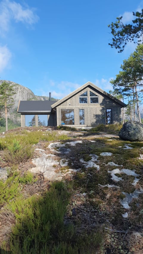 Atmospheric, wooden house with mountain view on lake