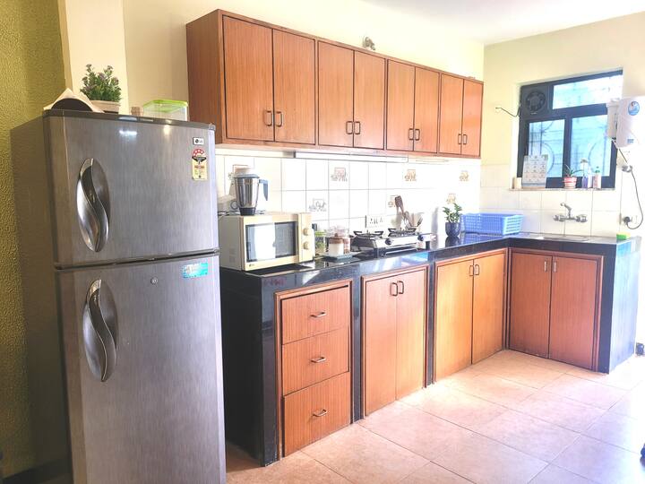 Step into our open styled kitchen. The space features high quality appliances, with cookware , dishes & crockery to ensure you have everything you need to prepare all your meals with ease. The Bright and open layout allows for a well lit space.
