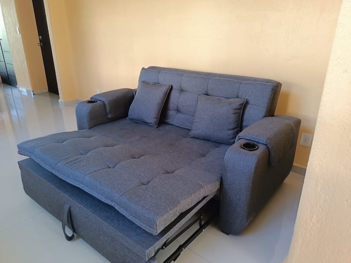 Mirador al Green的双人沙发床，旨在提供额外的舒适性，并充分利用空间。