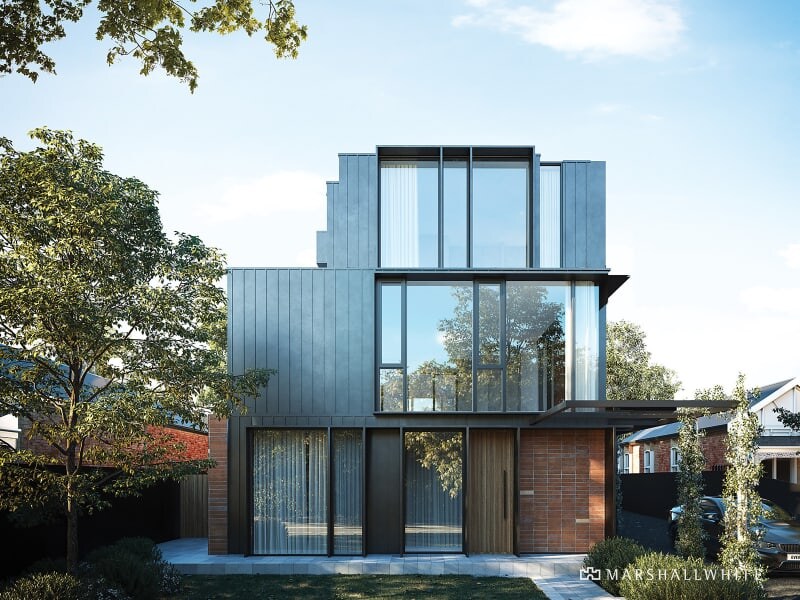 A modern three-story home features a blend of glass and metal exterior. Large windows allow plenty of natural light, while a landscaped yard with trees provides a sense of privacy. The entrance is framed by wooden accents, enhancing the home’s contemporary appeal.