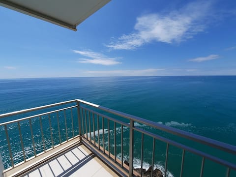 An apartment with panoramic oceanfront views.